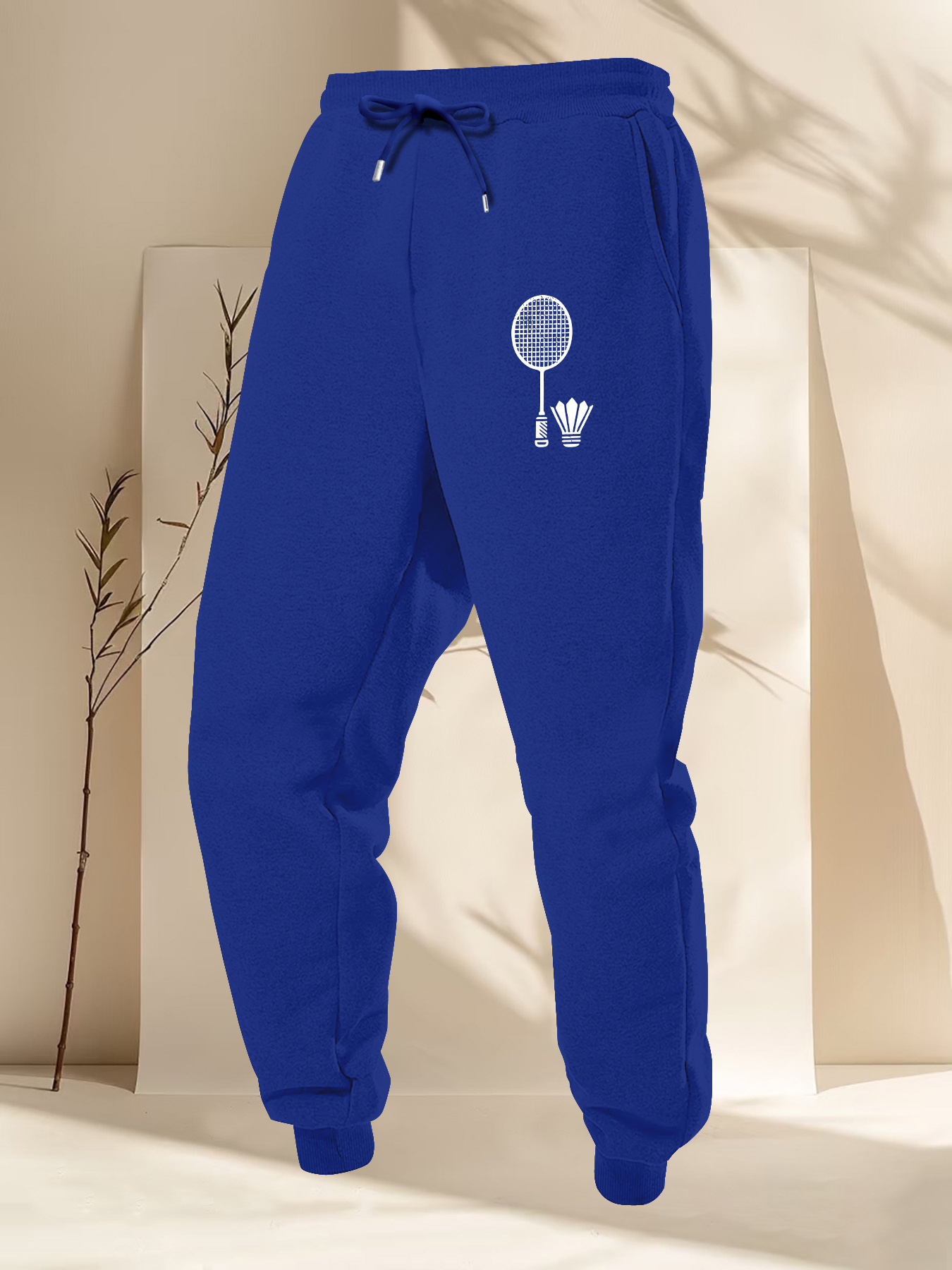 Pantalones Deportivos para Hom - Badminton Icon reseña y precio